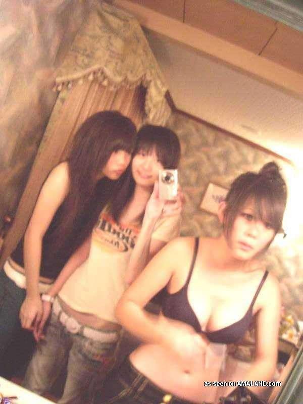 Naughty Korean chicks posing naked in a hotel room #69756384