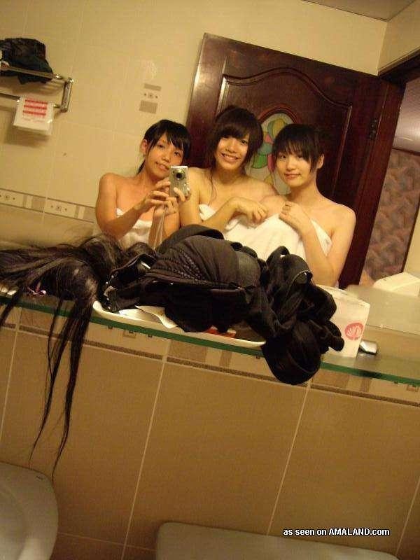 Naughty Korean chicks posing naked in a hotel room #69756396