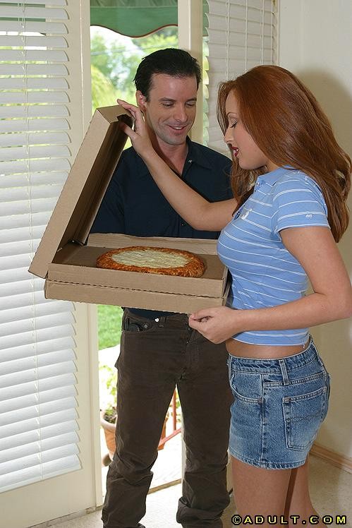 Lady ordered  a large sausage pizza are y hungry #78730658
