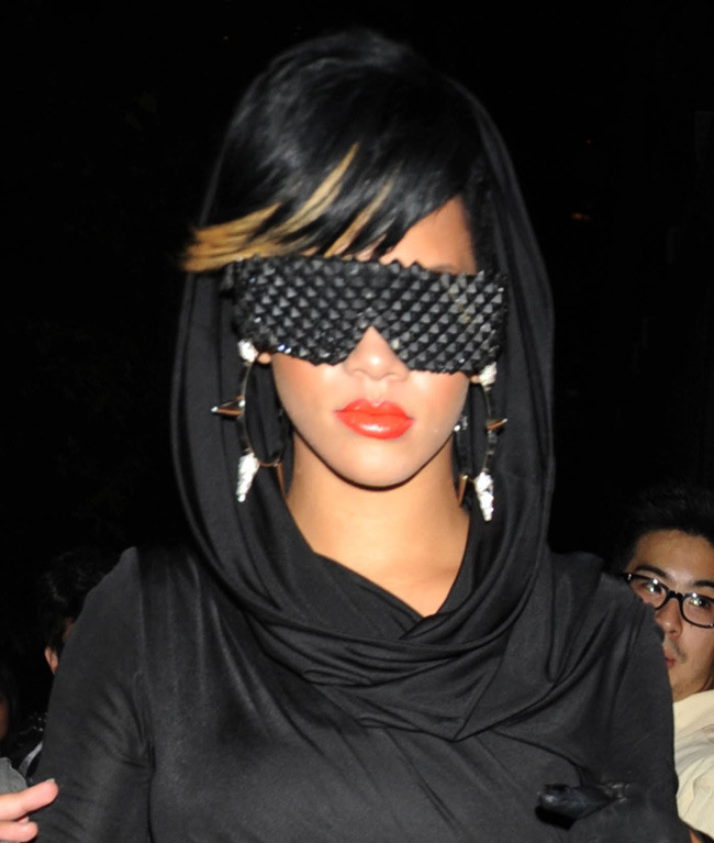 Rihanna wearing futuristic sunglasses at night #75381583