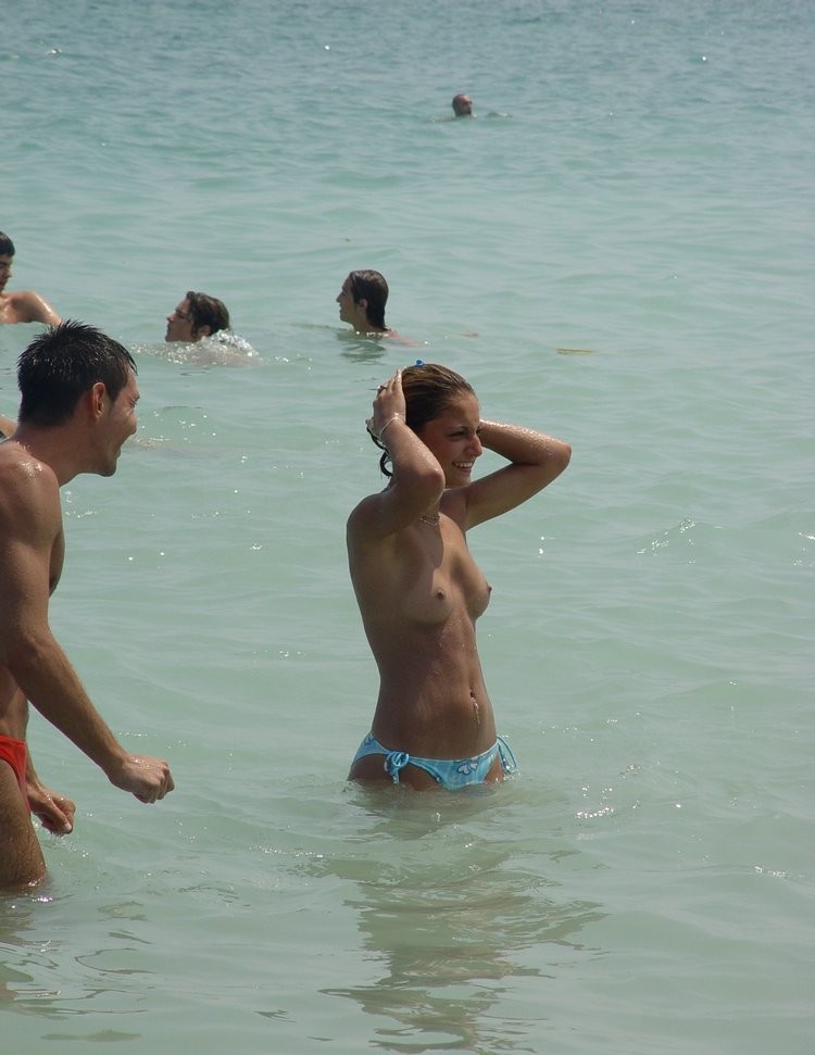 All eyes are on this younger nudist as she sunbathes #72251496