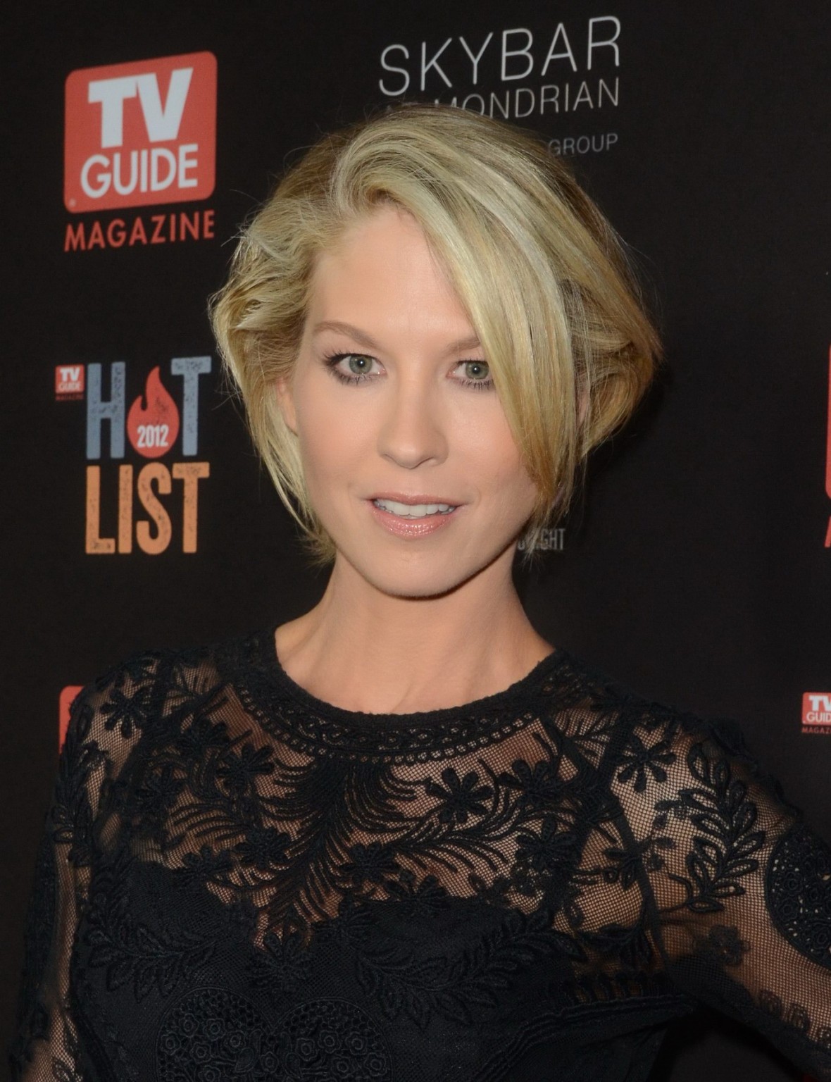 Jenna Elfman leggy wearing a black mini dress at TV Guide Magazine's Hot List Pa #75248291