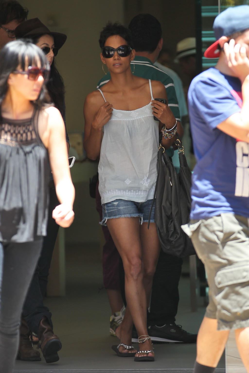 Halle Berry leggy going shopping in denim shorts  white top #75341737