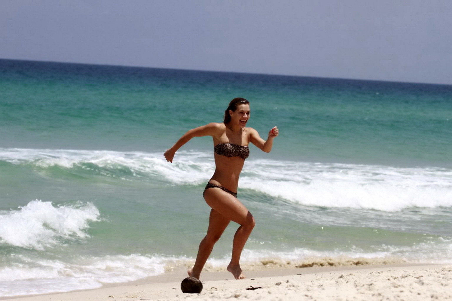 Carolina Dieckmann wearing a leopard print tube bikini on a beach in Barra da Ti #75240390