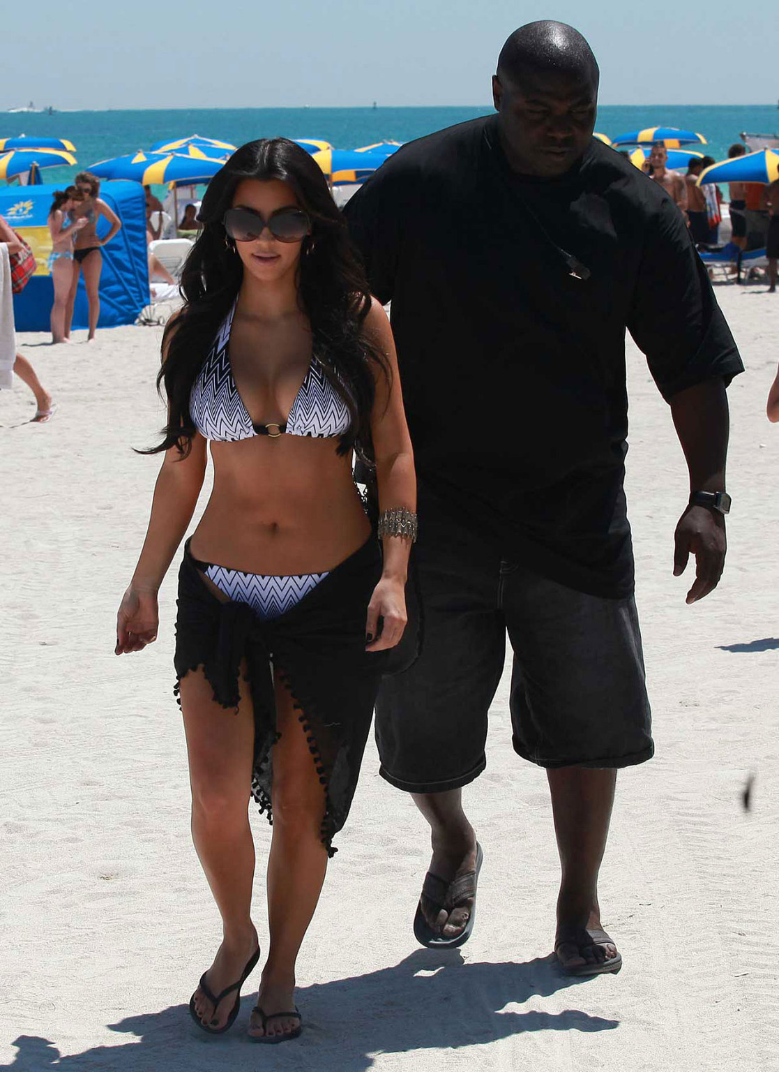 Kim Kardashian showing huge boobs in bikini on beach #75354518