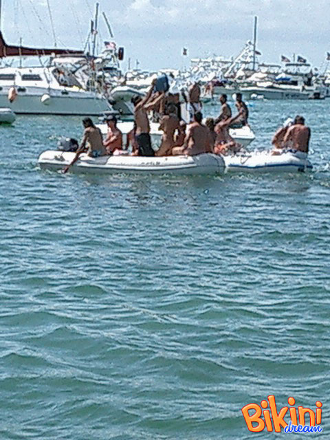 Girls get crazy at boating regatta #73191592
