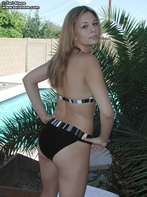 Bikini peep show next to a pool, you get to see the hardbody. #67782117