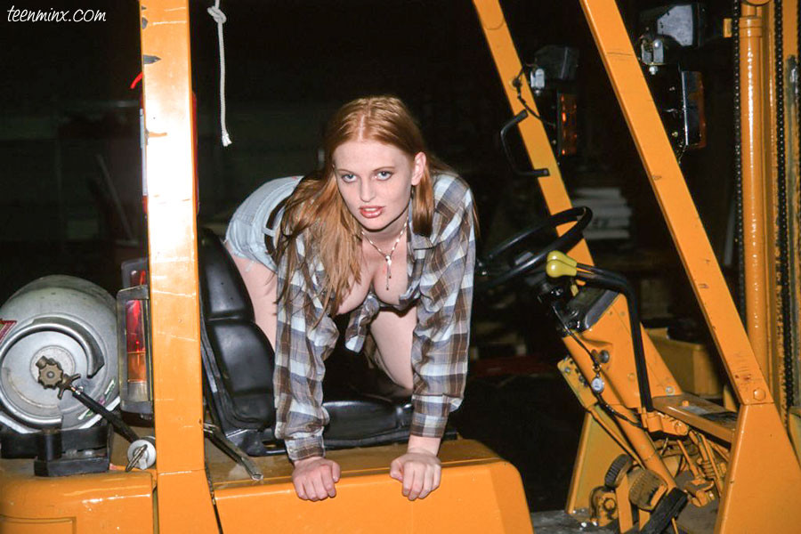 Freckled redhead toys her pink twat on a forklift #76299896