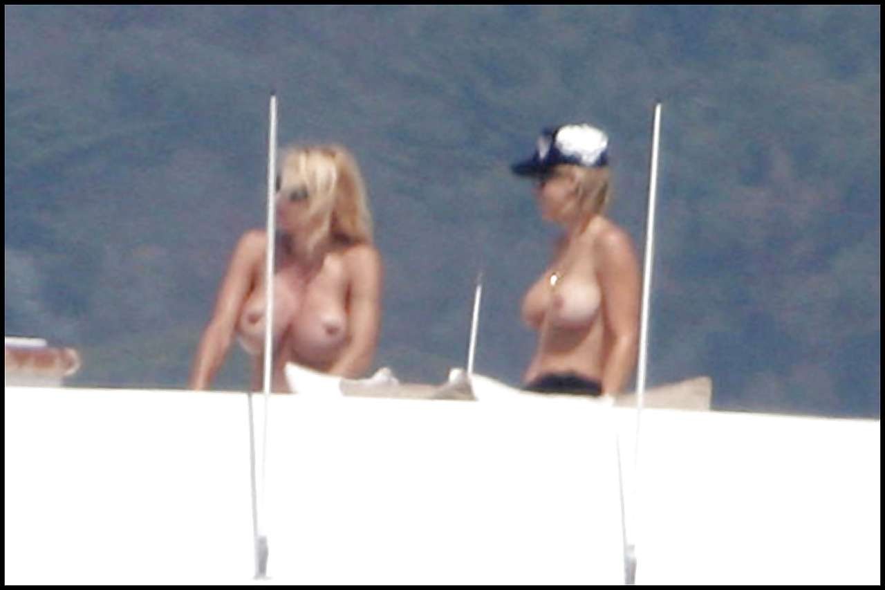 Pamela Anderson posing in stockings and showing her big boobs on yacht #75297633