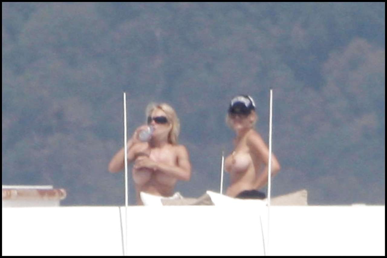 Pamela Anderson posing in stockings and showing her big boobs on yacht #75297638