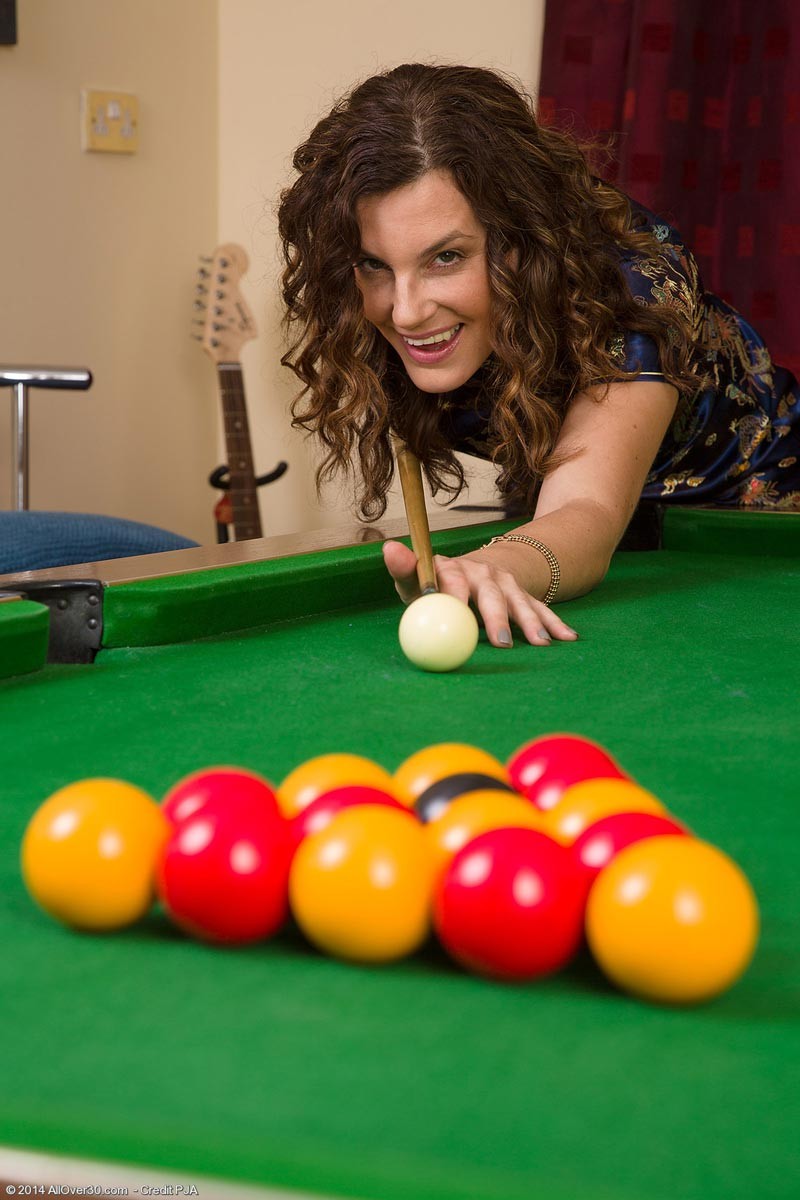 Hot milf strips after playing some pool #70748400