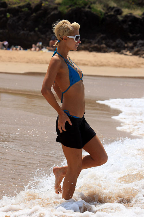 Paris Hilton posing very sexy in blue bikini on beach paparazzi pictures #75399129