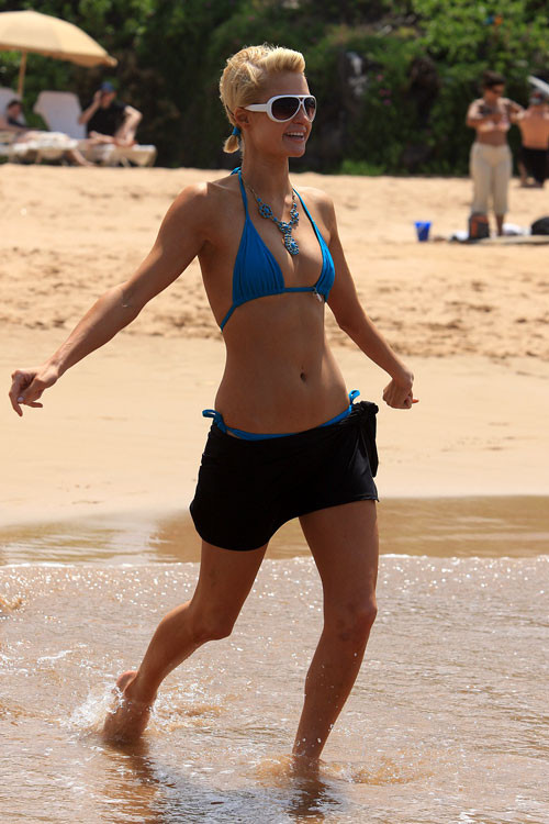 Paris Hilton posing very sexy in blue bikini on beach paparazzi pictures #75399177