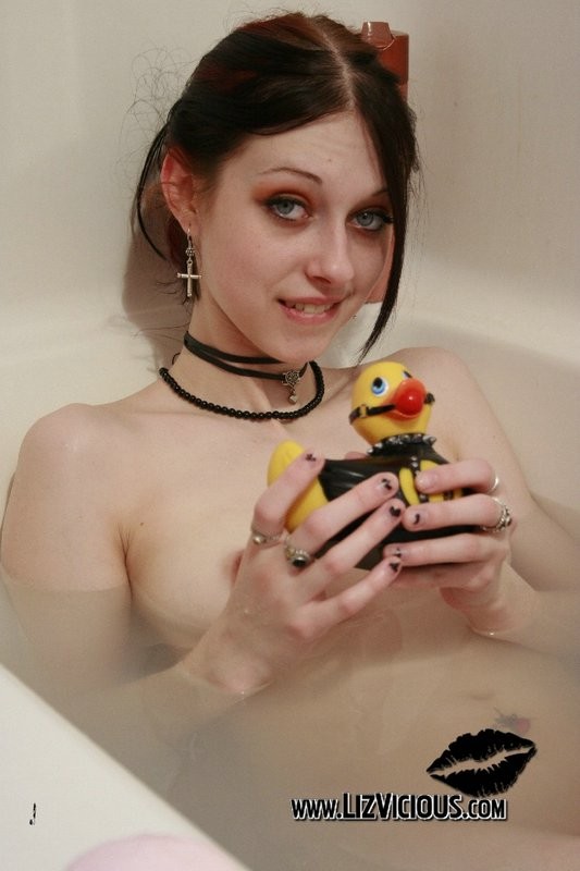 Playing with a leathered up rubber duckie on my pussy #70579673