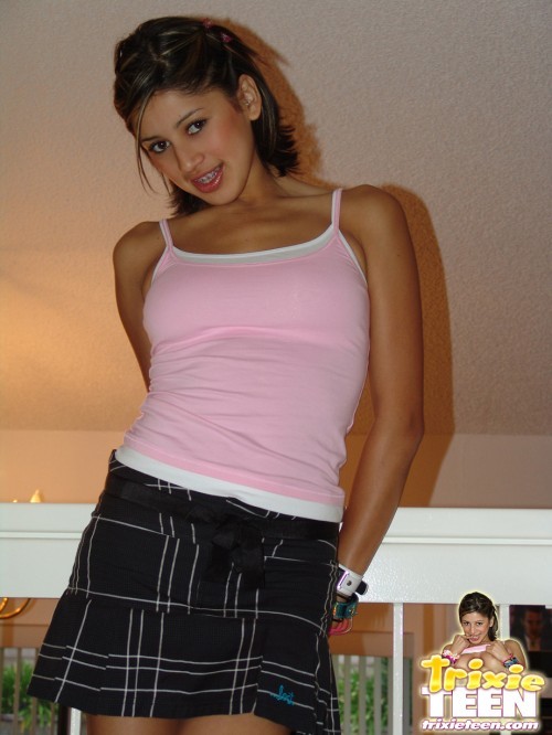Cute teen with braces shows her tits