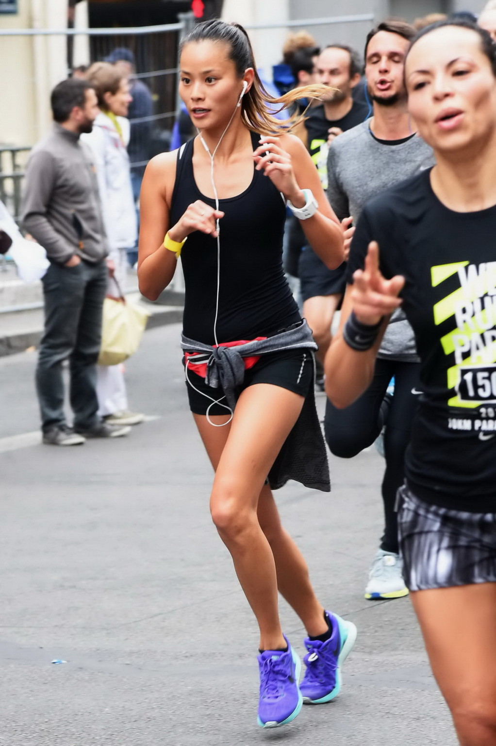 Jamie Chung wearing tiny black top and shorts while running in the Nike 10km Par #75184184