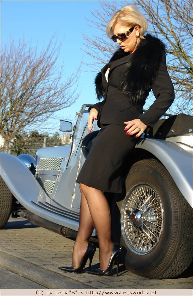 Elegant stocking lady with hot retro car #76477285