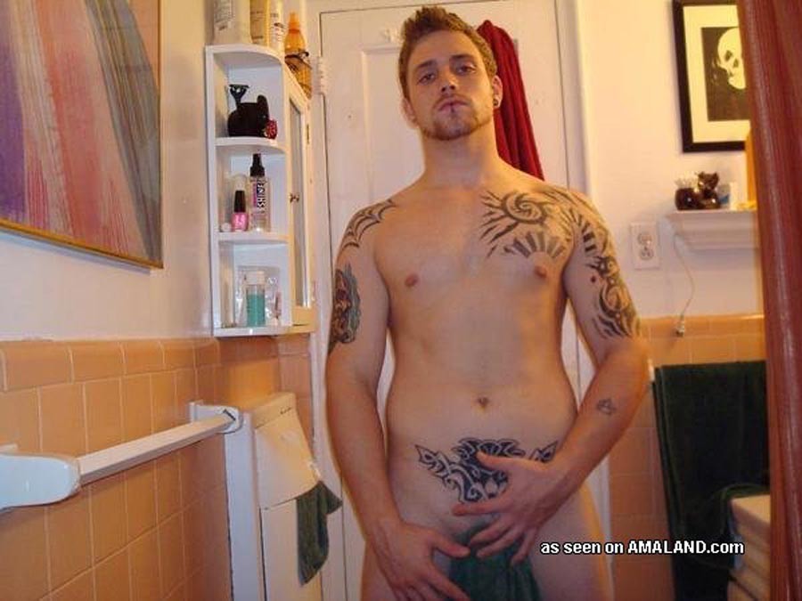 Tattooed stud shows off his stiff cock #76937846