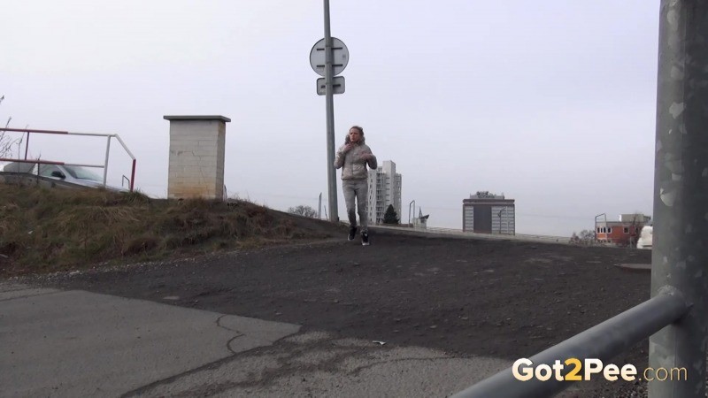 Sexy brunette pissing on an industrial estate #67493351