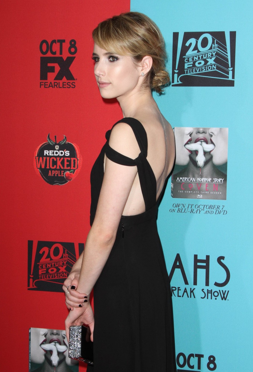 Emma Roberts cleavy and leggy wearing black backless dress at the American Horro #75184127