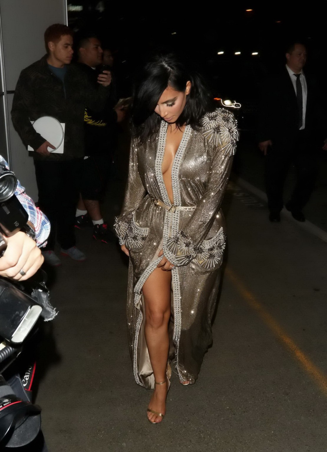 Kim Kardashian braless and pantyless in revealing golden smock arriving at 57th  #75173090