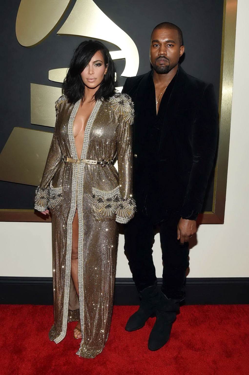 Kim Kardashian braless and pantyless in revealing golden smock arriving at 57th  #75173181