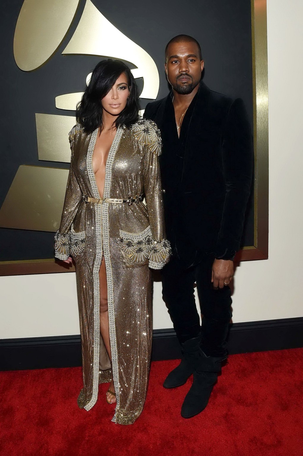 Kim Kardashian braless and pantyless in revealing golden smock arriving at 57th  #75173188