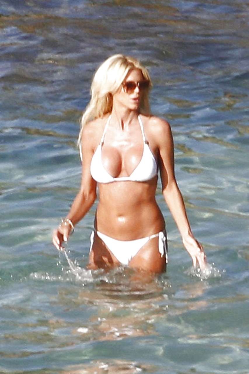 Victoria Silvstedt upskirt on beach and show mega cleavage in bikini #75273486
