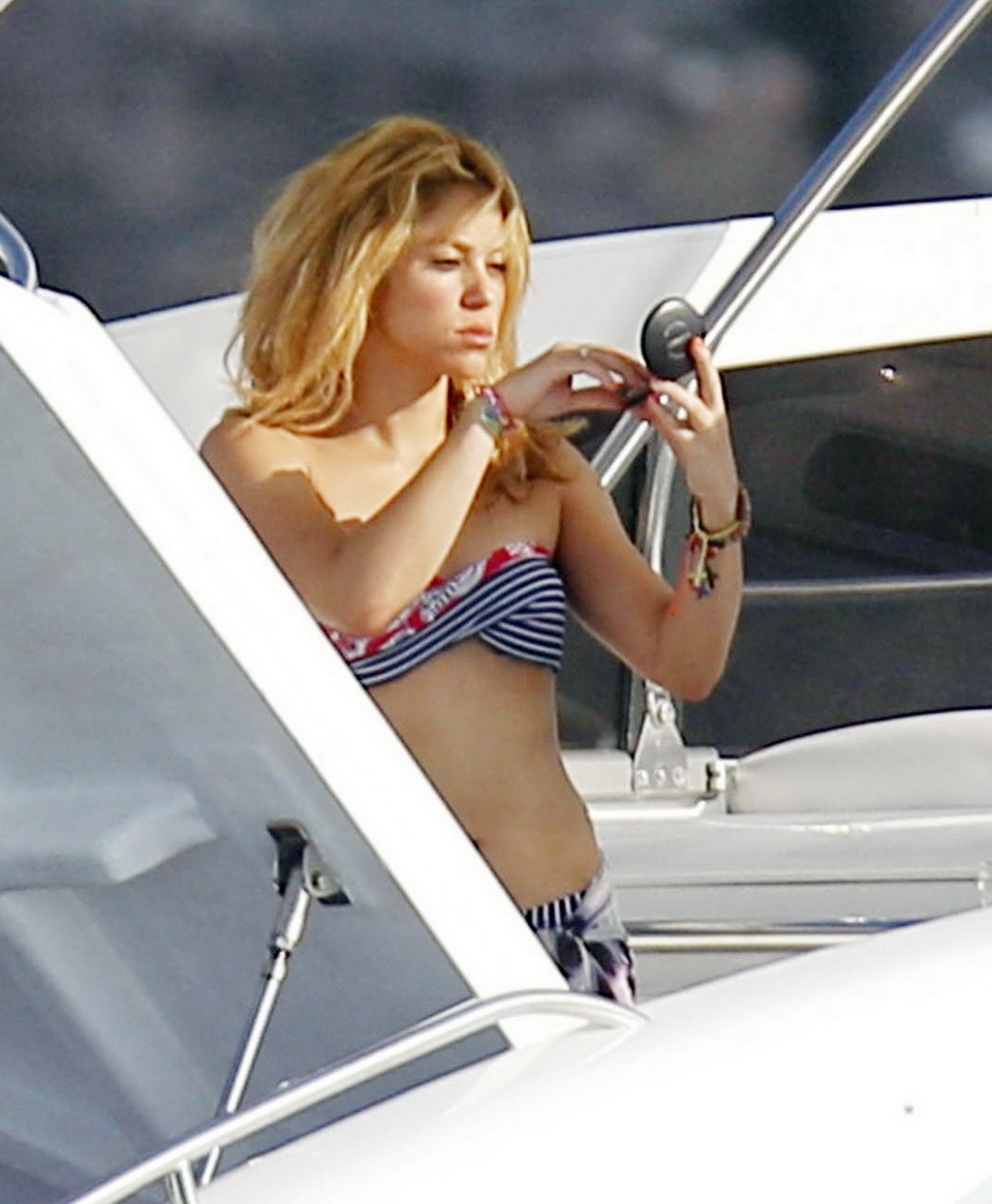 Shakira wearing navy striped bikini on a beach in Formentera #75255644