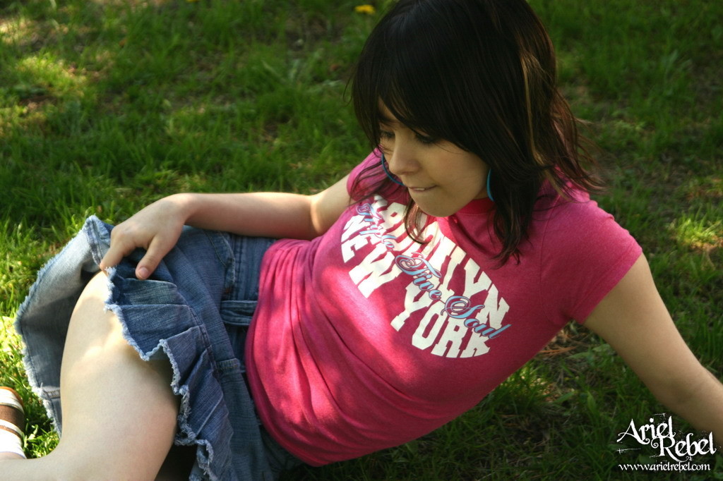 Teen in short skirt outdoors #67238193