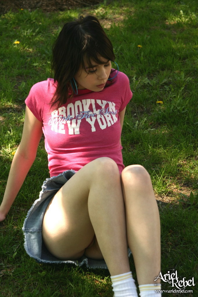 Teen in short skirt outdoors #67238209