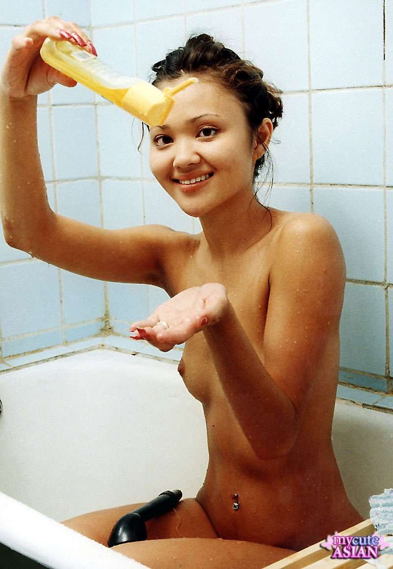 Asian soaps her perfect body in the shower #70005463
