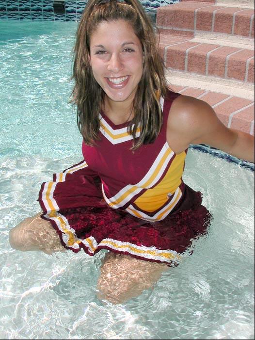Pictures of a cheerleader swimming in her uniform #60578578