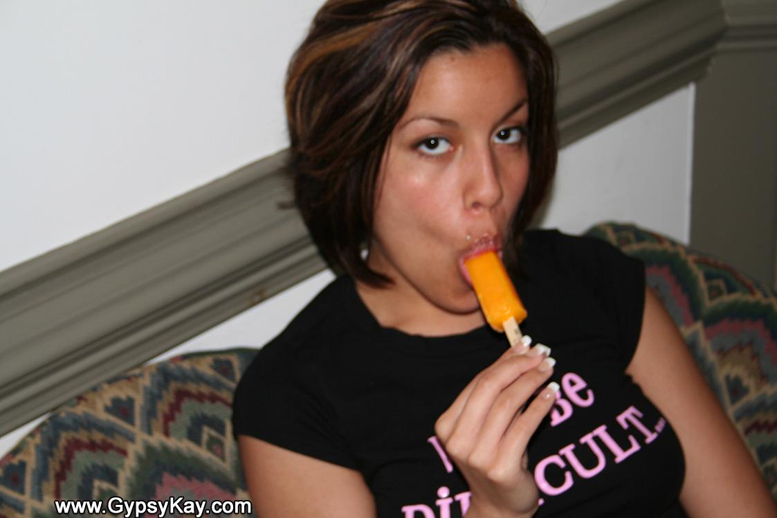 Pictures of teen Gypsy Kay putting something hard in her mouth