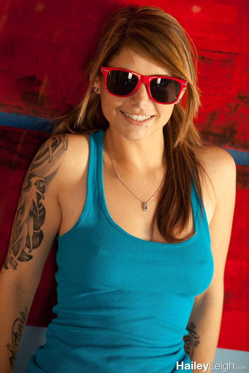 Pictures of Hailey Leigh teasing in red sunglasses and nothing else
