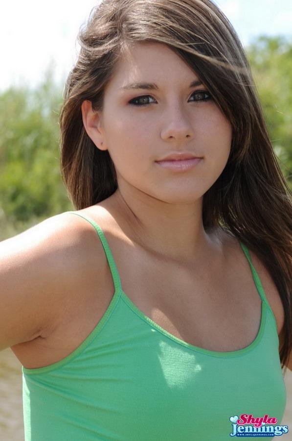 Brunette coed Shyla Jennings flashes in her green tank top in the field #59968370