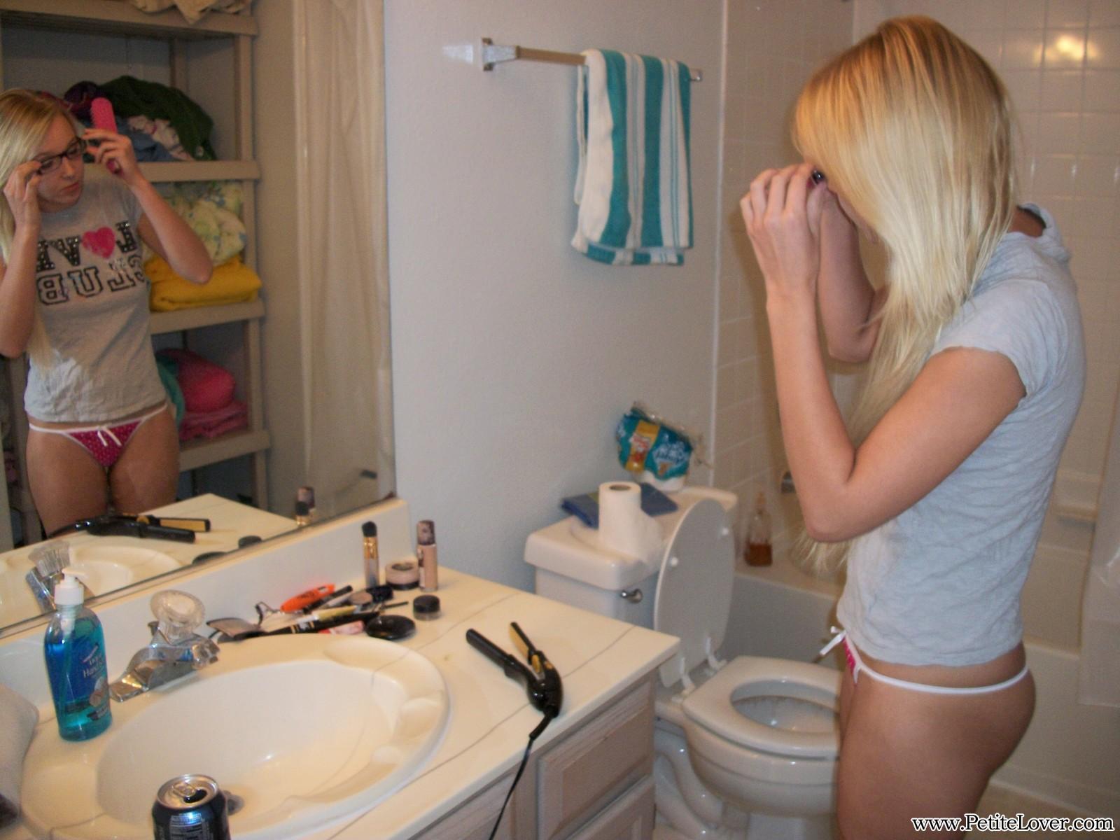 Petite blonde teen Elle invites you into the bathroom to watch her get ready #54158940