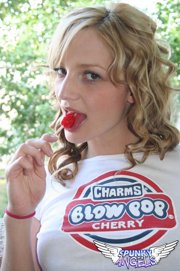 Pictures of a cute teen sucking on a lollipop #60819587