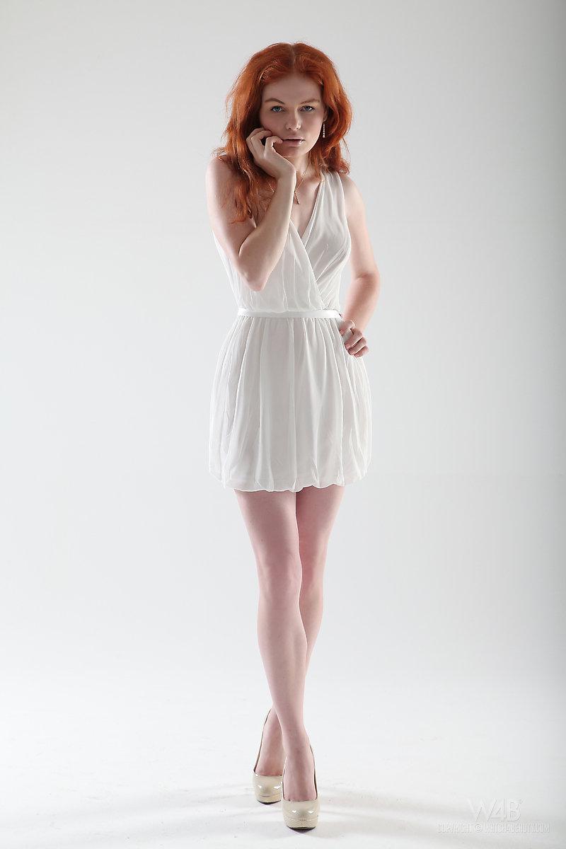 Beautiful redhead Barbara Babeurre strips out of her white dress in the studio #60913204