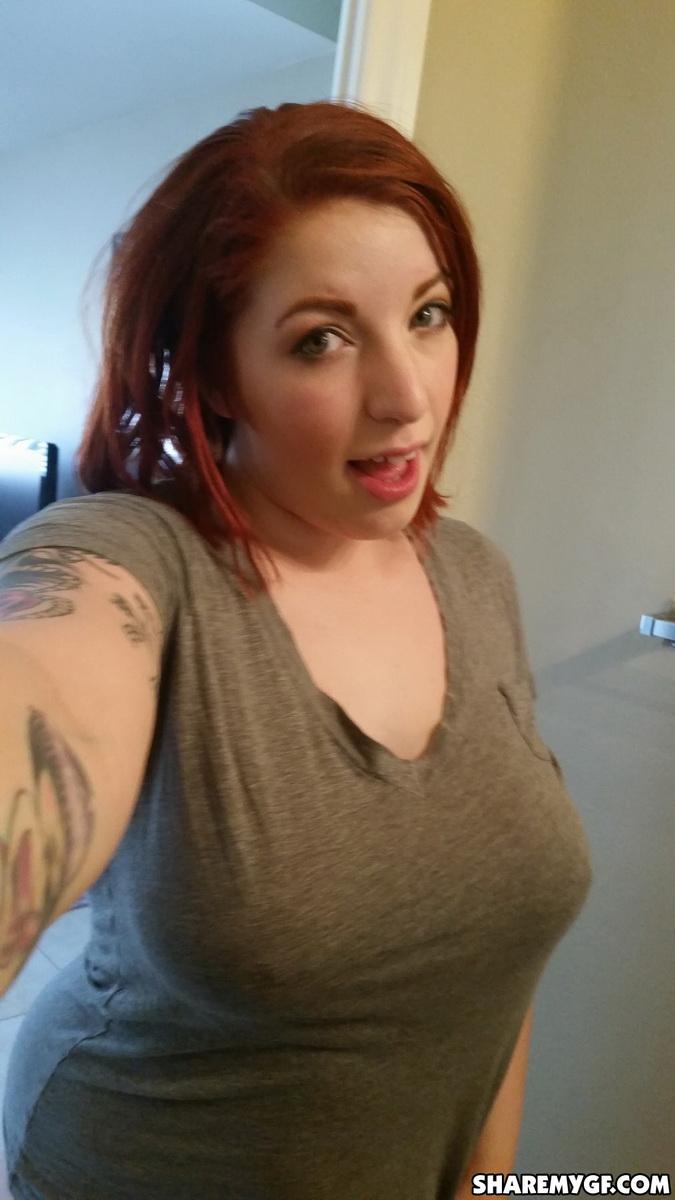 Busty Redhead Gf Shows Off Her Big Natural Tits As She Takes Selfies In The Mirror Porn Pictures