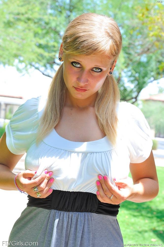 Pictures of busty blonde teen Alice fucking herself with a cucumber outside #52989280