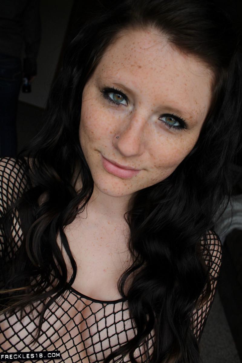 Sexy amateur girl Freckles 18 teases in her black mesh dress