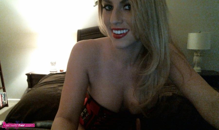 Blonde cam girl Natasha Adams teases in a sexy red corset #59695520