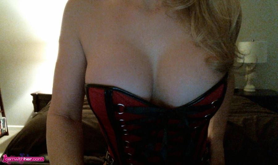 Blonde cam girl Natasha Adams teases in a sexy red corset #59695617