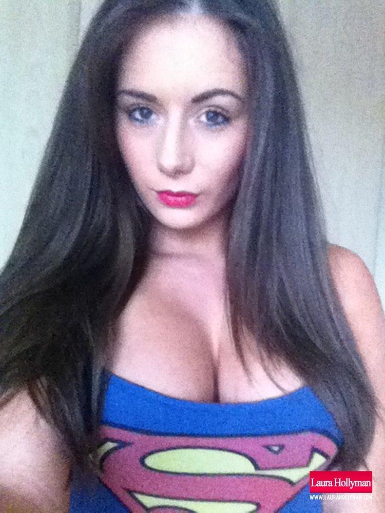 Laura Hollyman strips out of her sexy Supergirl top #58846921
