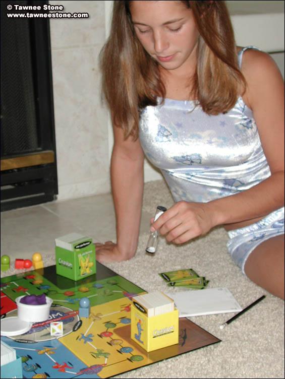 Pictures of Tawnee Stone playing a board game with herself #60063189