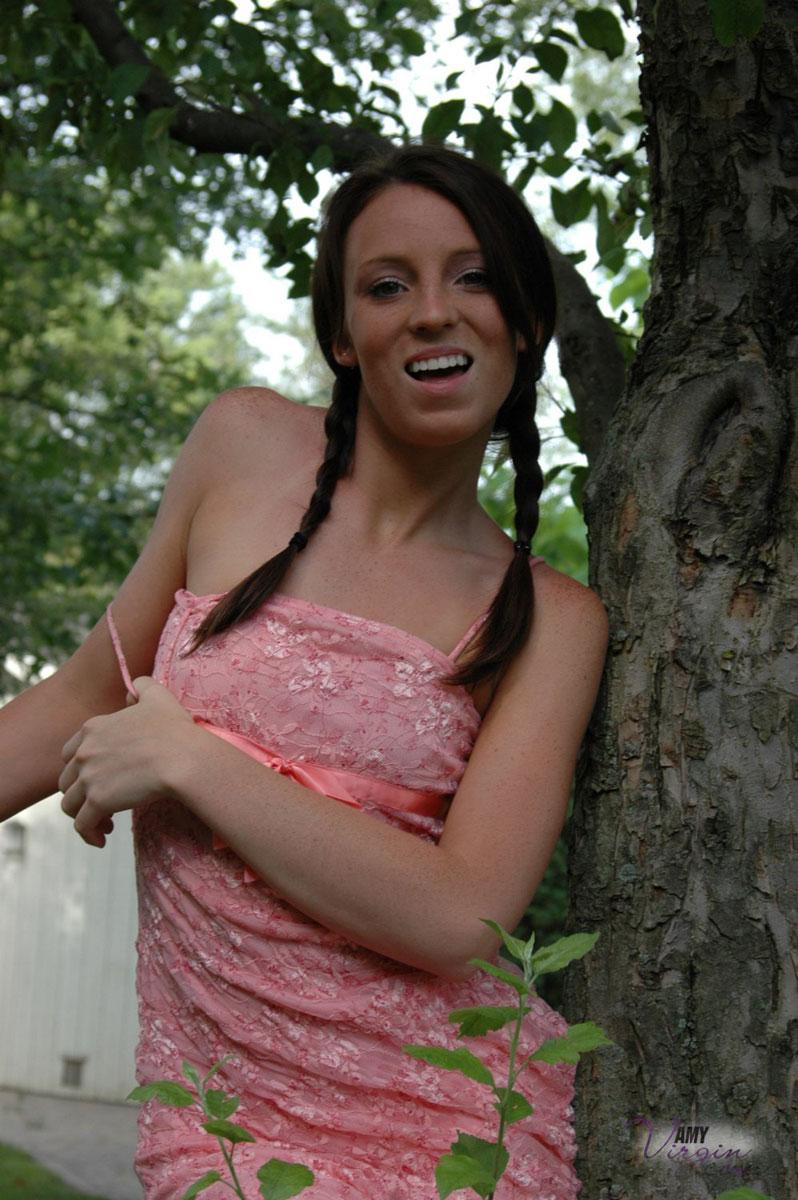 Pictures of teen Amy Virgin goofing off in the back yard