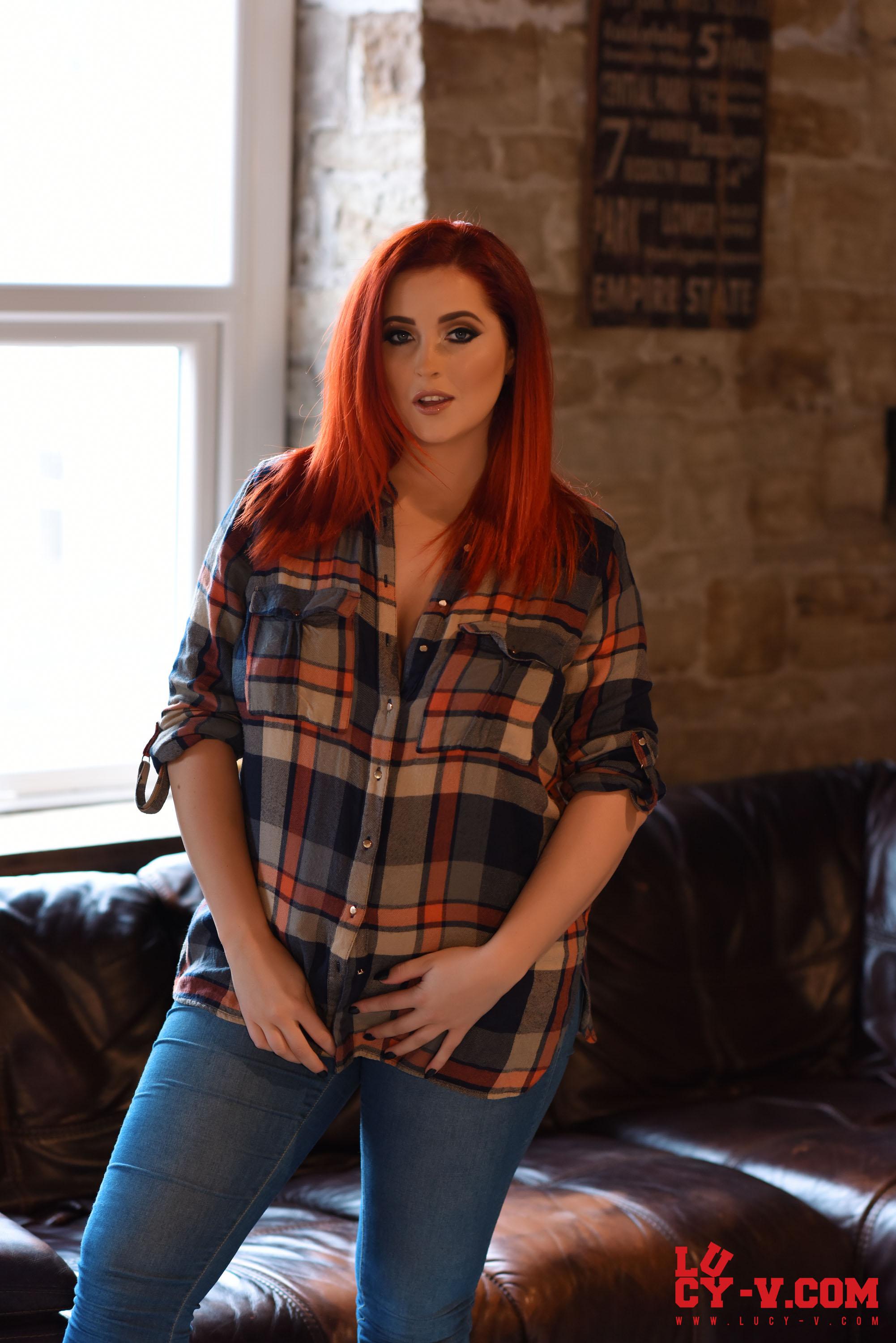 Lucy V teasing on the sofa in plaid shirt and jeans #59126881