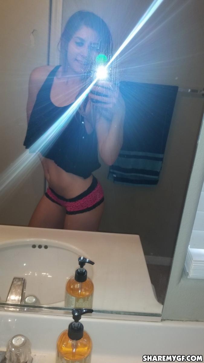 Skinny girlfriend takes selfshot pictures in her cute pink panties in the bathroom mirror #60789551