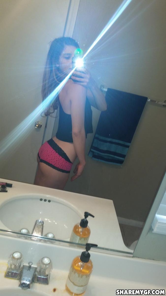 Skinny girlfriend takes selfshot pictures in her cute pink panties in the bathroom mirror #60789562